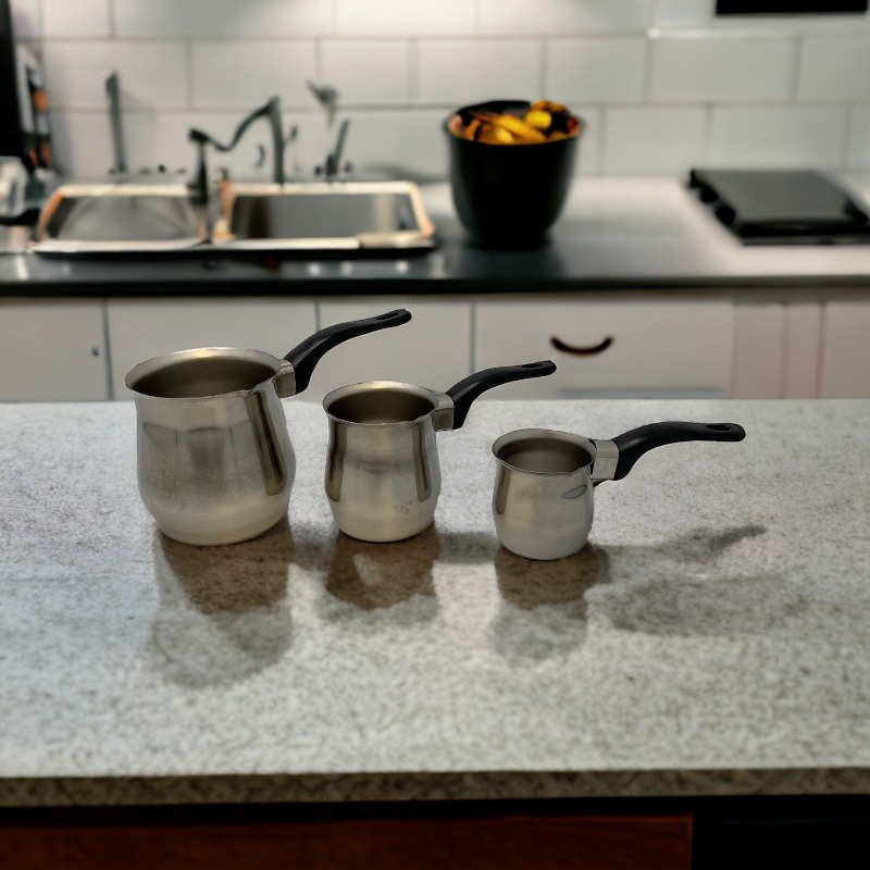 A SET OF THREE COFFEE POTS